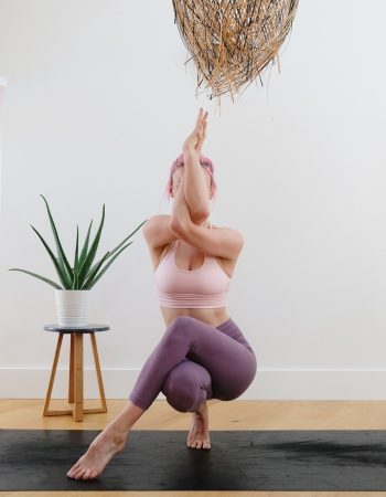 woman in black panty kneeling on floor